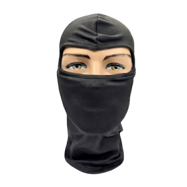 Balaclava cerrada negra en licra elástica de una sola pieza. Pasamontañas táctico fijo que cubre cabeza, rostro y cuello sin partes móviles. Ideal para uso bajo casco, motociclismo, airsoft y protección solar en Colombia. Disponible en ARMY STORE